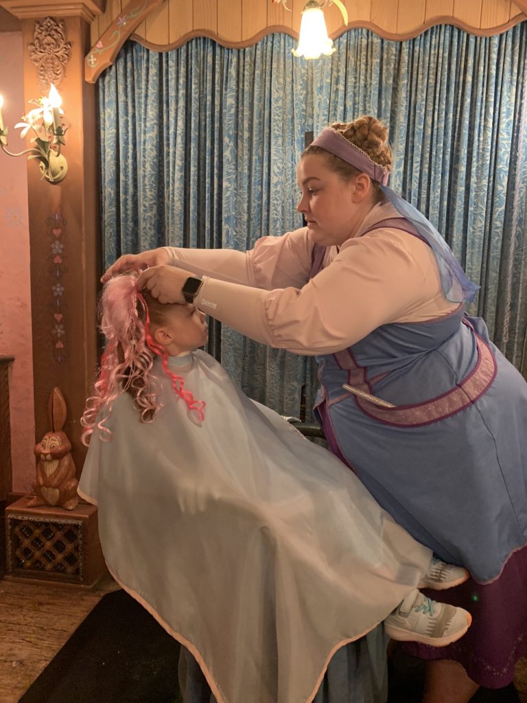 Disneyland Extras: Little girl getting a princess makeover at the Bibbidi Bobbidi Boutique in Disneyland