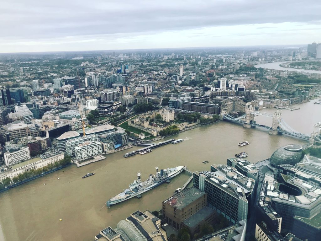 View of the London Bridge and River Thames from The Shard during a recent secrets to budget travel weekend layover in London.