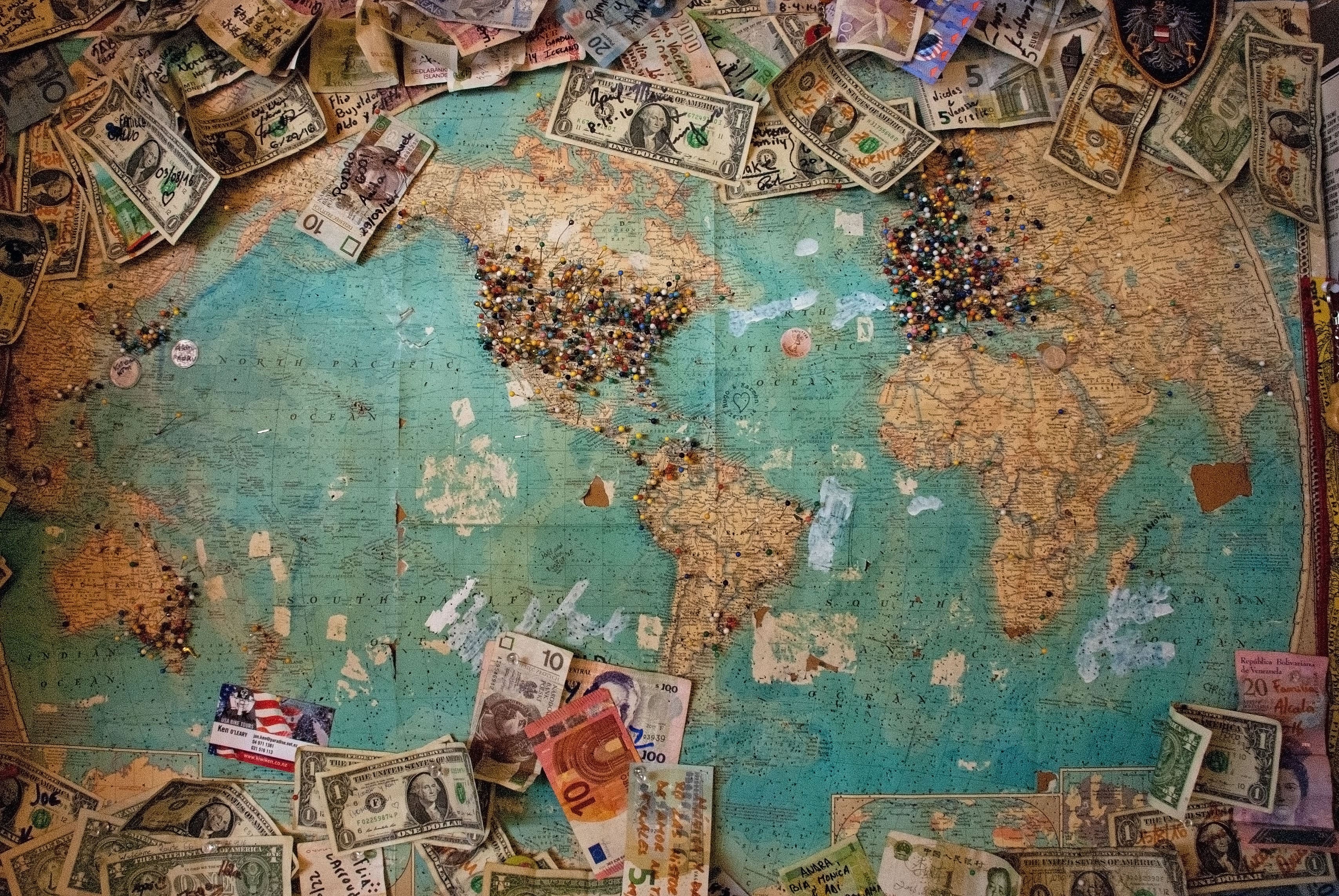 secrets to budget travel world map and money from different countries
