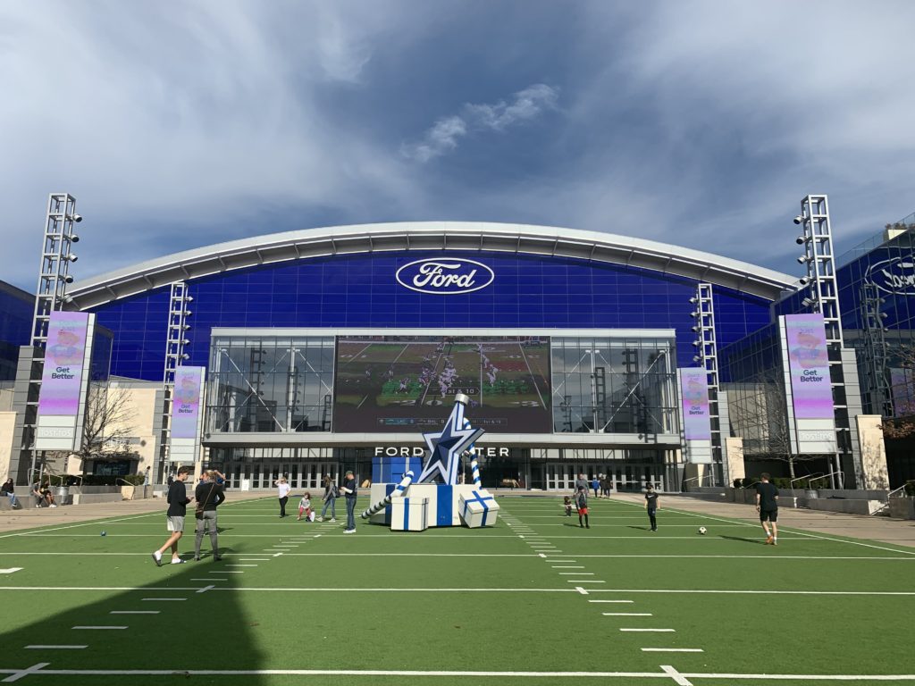 Exterior of the Star in Frisco Texas with football field and huge tv.