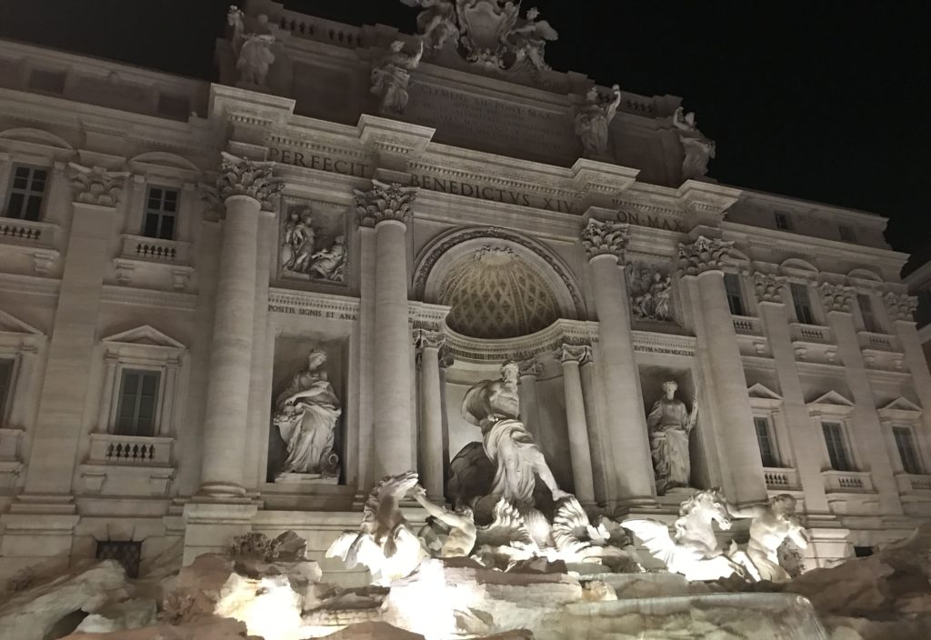 The Trevi Fountain in Rome at night.