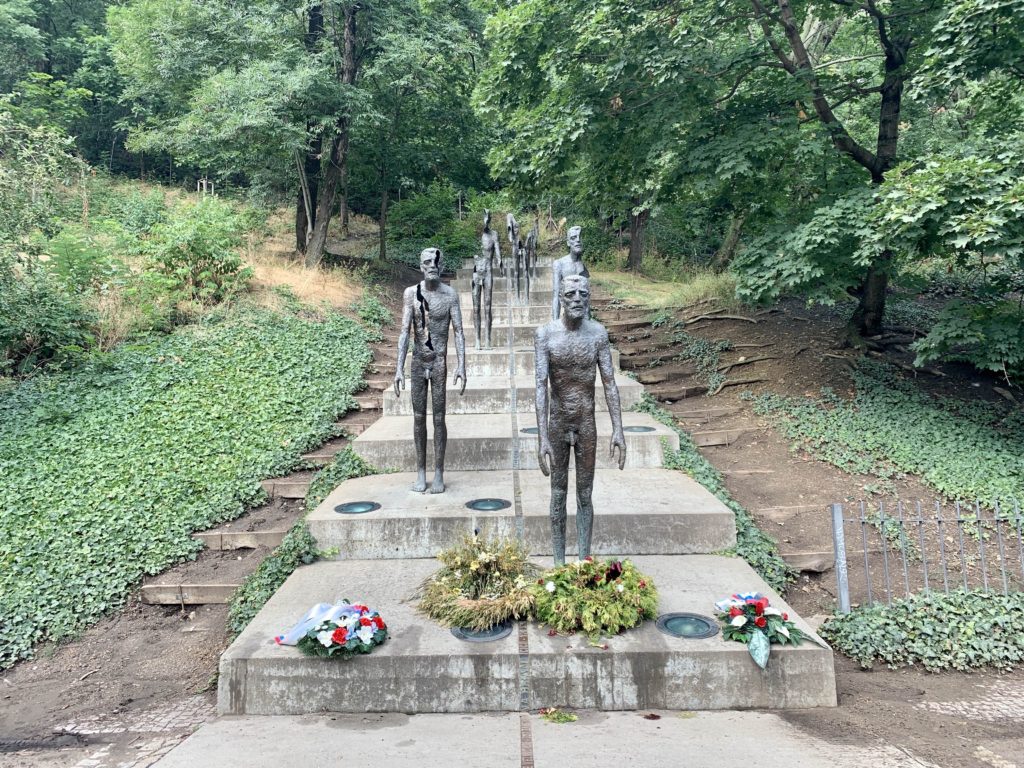 The Memorial to the Victims of Communism in Prague. A series of statues of a man decaying. 