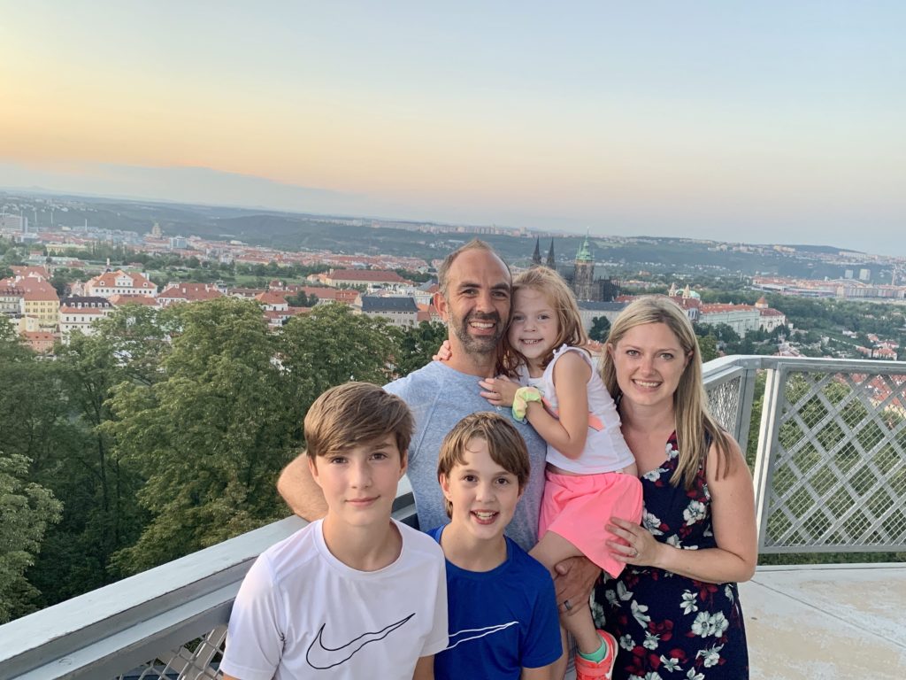 family of five on the observation deck of the petrin tower