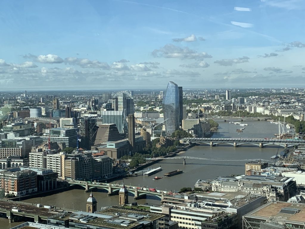 View of the River Thames and bridges in London from the SkyGarden which is free to visit and helps keep costs low when visiting London on a budget