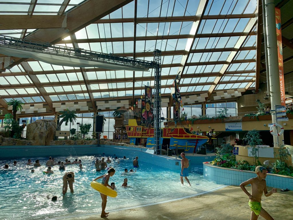 Kids playing in the wave pool at the Aquapalace Praha